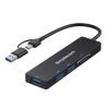 Black USB-C hub with four blue USB 3.0 ports and an SD card slot, branded Simplecom, connected by a short cable